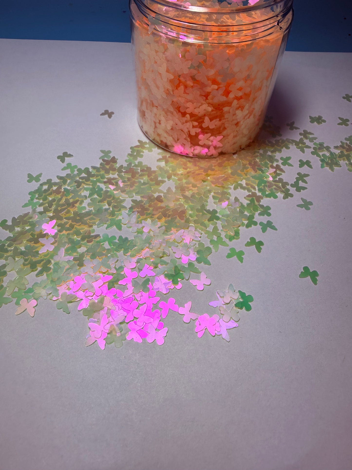 #676 PEACH HOLO BUTTERFLIES