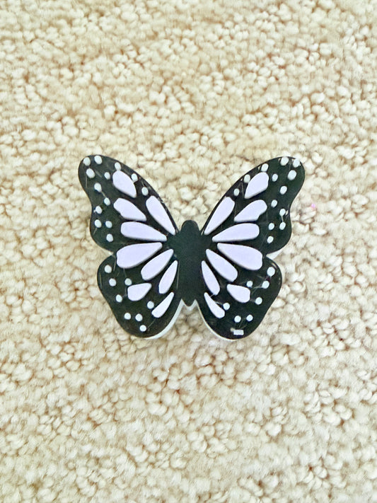 3-D BUTTERFLY WITH BLACK PURPLE AND WHITE GLOW IN THE DARK STRAW HUGGY