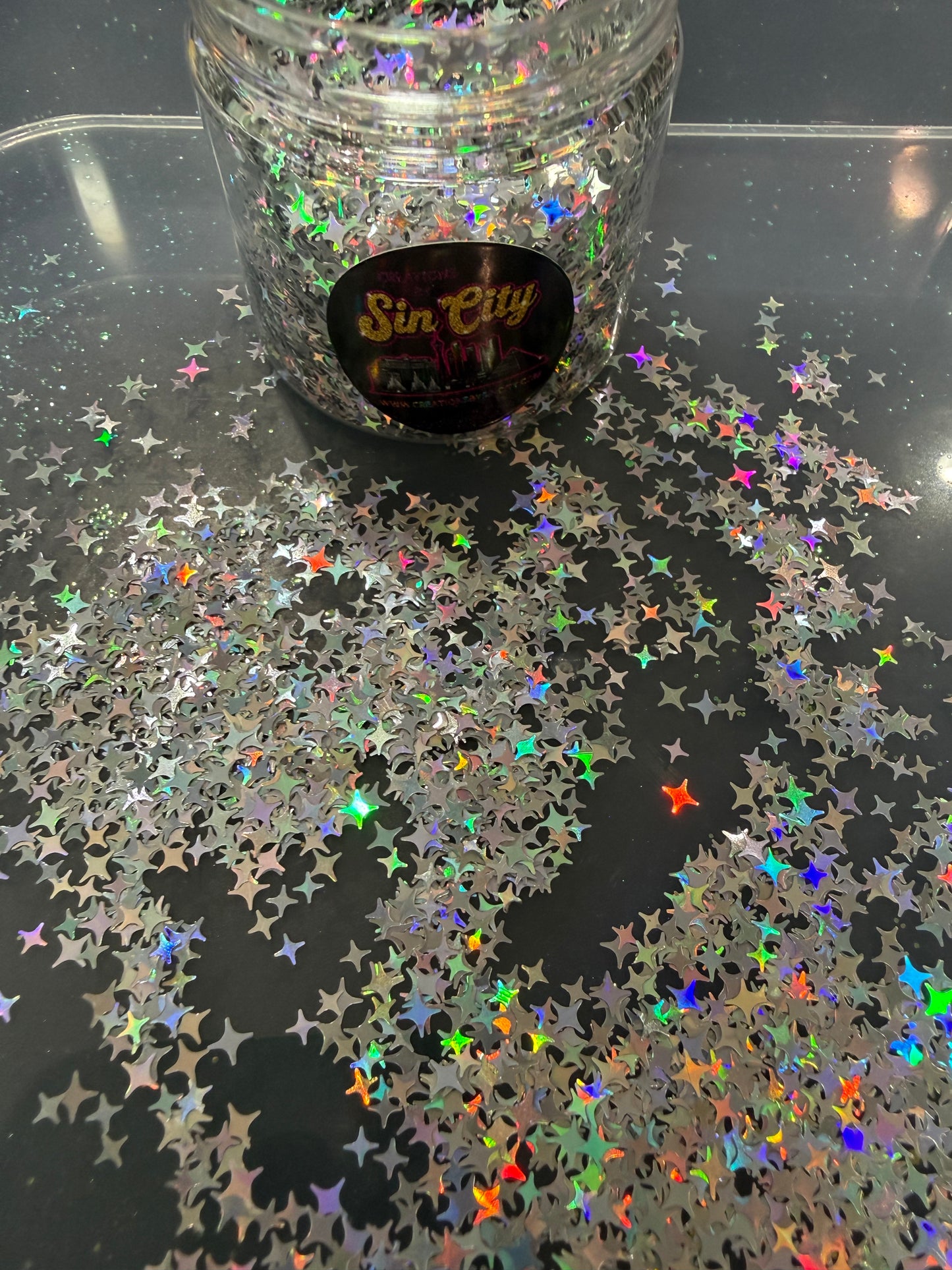 HOLOGRAPHIC FOUR POINT STARS (SILVER)￼